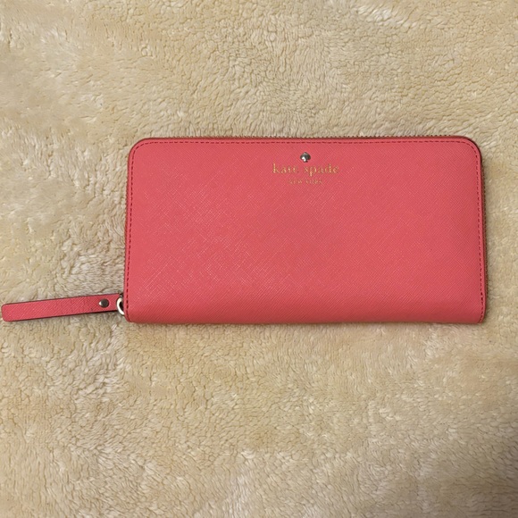 kate spade Handbags - Kate Spade Zip-Around Wallet in Bikini Pink